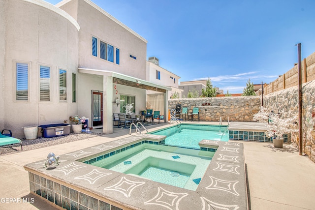 12571 New Dawn Dr, El Paso, TX 79928 - view of swimming pool with a patio, a fenced backyard, and a pool with connected hot tub