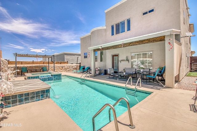 12571 New Dawn Dr, El Paso, TX 79928 - view of pool with a patio area, a pool with connected hot tub, and outdoor lounge area