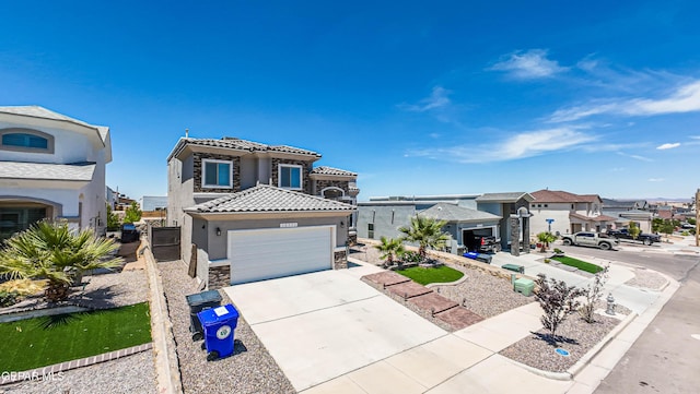12571 New Dawn Dr, El Paso, TX 79928 - view of front of house with a tile roof, an attached garage, concrete driveway, a residential view, and stucco siding