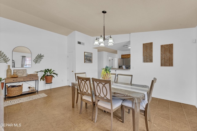 5609 Rick Husband Dr, El Paso, TX 79934 - dining space with a chandelier and baseboards