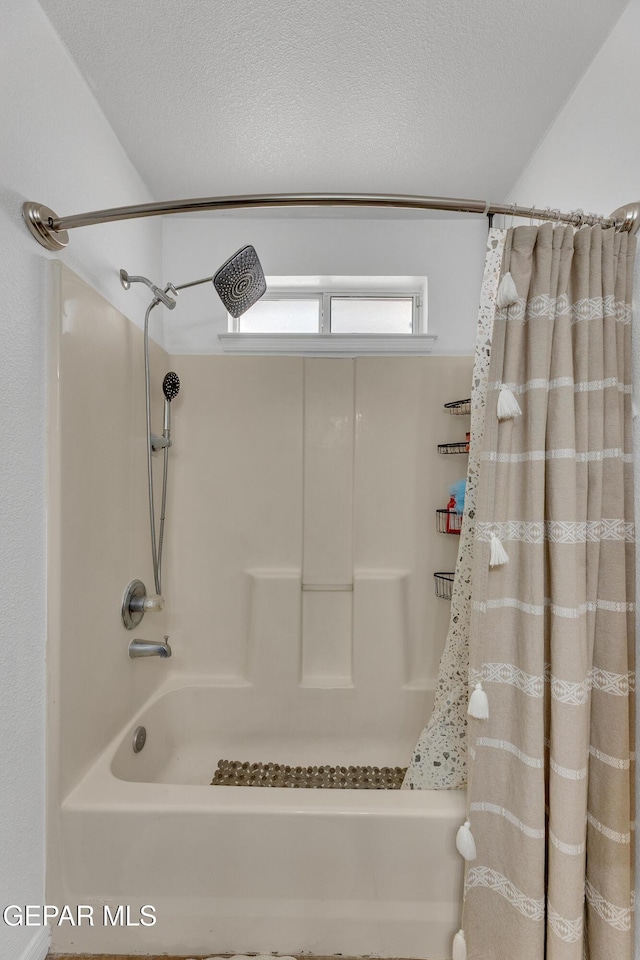 5609 Rick Husband Dr, El Paso, TX 79934 - full bathroom with shower / bath combo with shower curtain