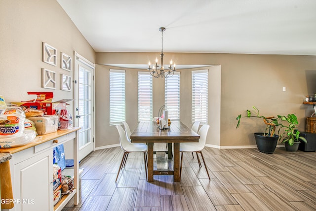 12140 Mesquite Thorn Dr, El Paso, TX 79934 - dining area with a chandelier, plenty of natural light, and wood tiled floors