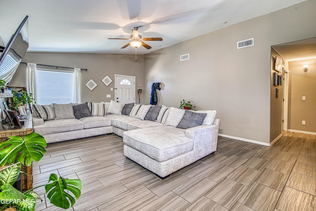 12140 Mesquite Thorn Dr, El Paso, TX 79934 - living area featuring ceiling fan, wood finish floors, and vaulted ceiling