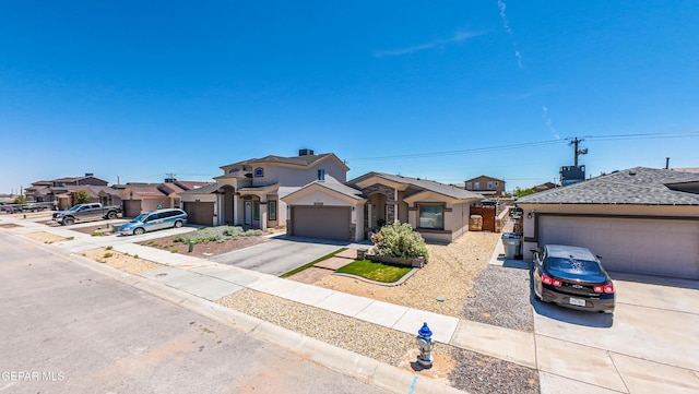 12140 Mesquite Thorn Dr, El Paso, TX 79934 - view of front of property with driveway, stucco siding, and a garage