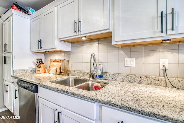12140 Mesquite Thorn Dr, El Paso, TX 79934 - kitchen with dishwasher, white cabinets, light stone counters, and tasteful backsplash