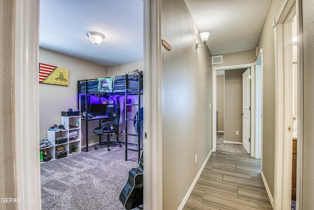 12140 Mesquite Thorn Dr, El Paso, TX 79934 - hallway featuring baseboards and wood tiled floors