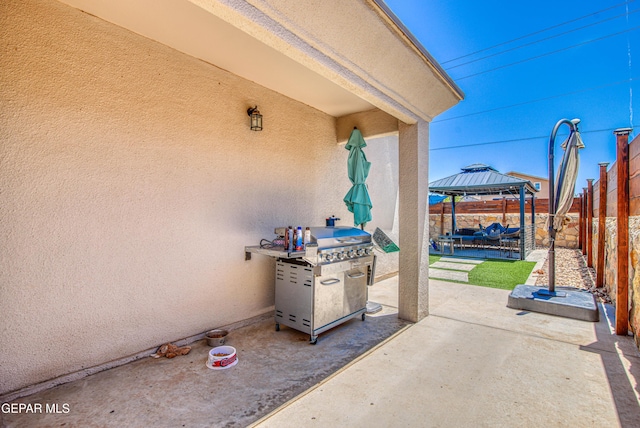 12140 Mesquite Thorn Dr, El Paso, TX 79934 - fenced backyard featuring a gazebo, a grill, and a patio