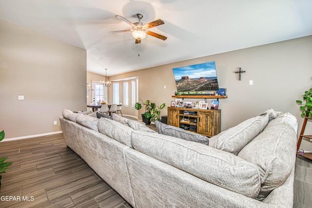 12140 Mesquite Thorn Dr, El Paso, TX 79934 - living room with ceiling fan, a chandelier, and wood finished floors