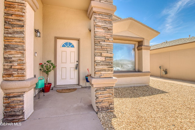 12140 Mesquite Thorn Dr, El Paso, TX 79934 - property entrance with stucco siding and stone siding
