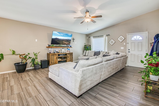 12140 Mesquite Thorn Dr, El Paso, TX 79934 - living room featuring a ceiling fan, wood finish floors, and vaulted ceiling