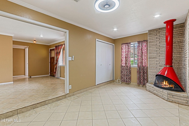 3417 Thomason Ave, El Paso, TX 79904 - unfurnished living room featuring tile patterned flooring, crown molding, a wood stove, and recessed lighting
