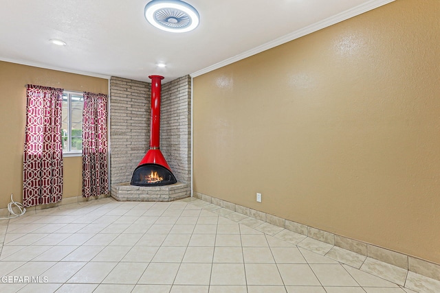 3417 Thomason Ave, El Paso, TX 79904 - spare room featuring ornamental molding, light tile patterned floors, and a wood stove