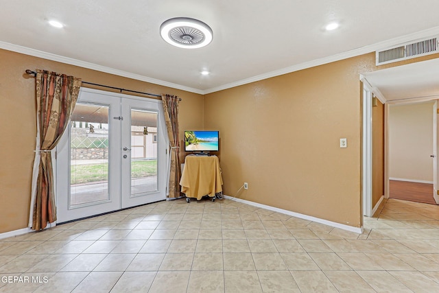 3417 Thomason Ave, El Paso, TX 79904 - empty room with french doors, crown molding, light tile patterned flooring, and recessed lighting