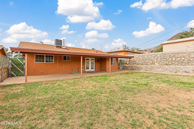 3417 Thomason Ave, El Paso, TX 79904 - back of house featuring french doors, a patio, a gate, and stucco siding