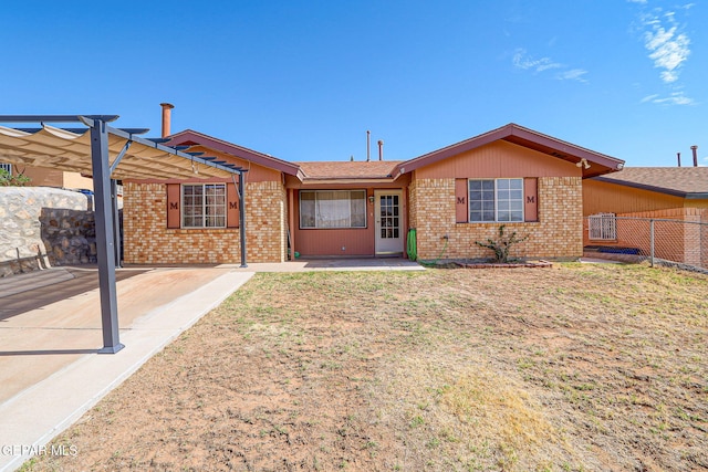 3417 Thomason Ave, El Paso, TX 79904 - rear view of property featuring brick siding