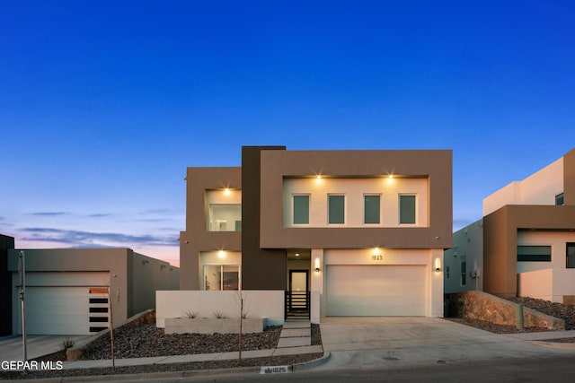 1837 Bridle, El Paso, TX 79911 - modern home featuring stucco siding, concrete driveway, and a garage