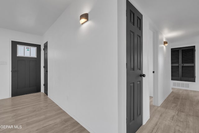 10113 Shenandoah St, El Paso, TX 79924 - hallway with light wood-style flooring