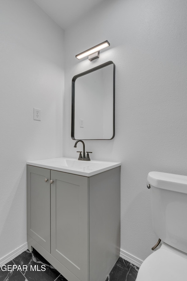 10113 Shenandoah St, El Paso, TX 79924 - half bath featuring vanity and marble look tiles