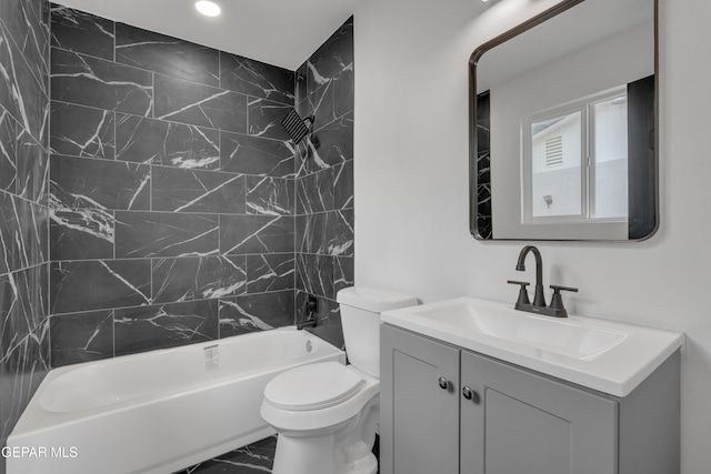 10113 Shenandoah St, El Paso, TX 79924 - full bath with vanity, washtub / shower combination, marble look tiles, and recessed lighting
