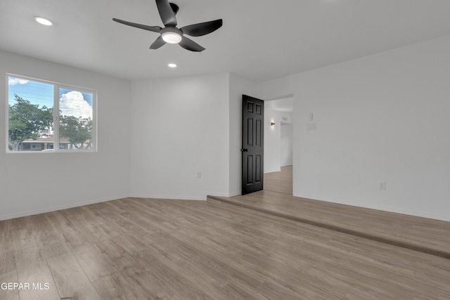 10113 Shenandoah St, El Paso, TX 79924 - unfurnished room featuring light wood-type flooring, ceiling fan, and recessed lighting