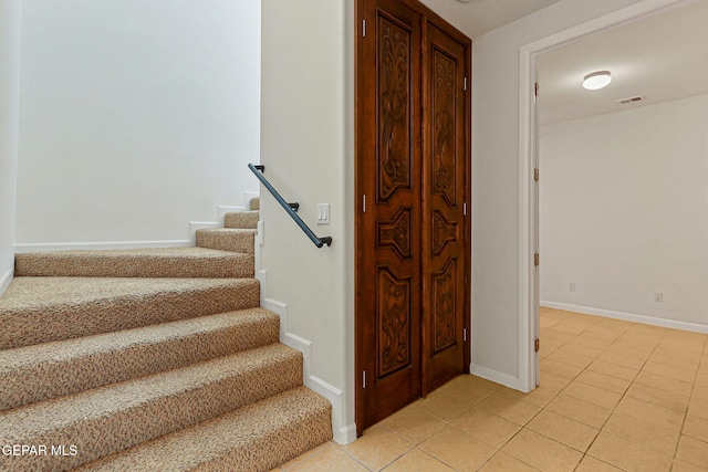 6514 Franklin Cove Place, El Paso, TX 79912 - staircase with tile patterned floors and baseboards