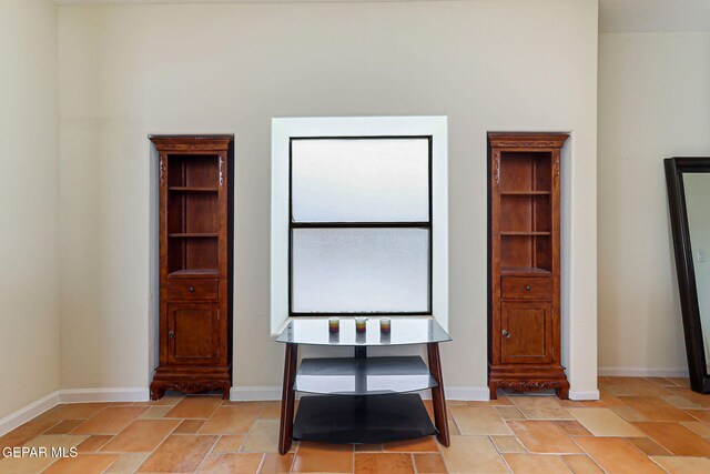 6514 Franklin Cove Place, El Paso, TX 79912 - bedroom featuring light stone finish flooring
