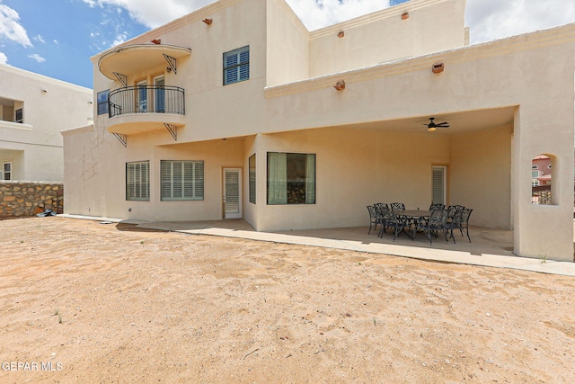 6514 Franklin Cove Place, El Paso, TX 79912 - back of property featuring a balcony, a patio, and stucco siding