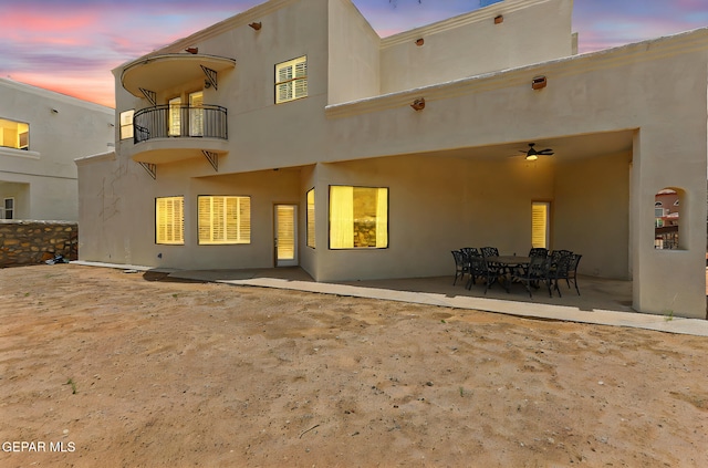 6514 Franklin Cove Place, El Paso, TX 79912 - back of property with a balcony, a patio, and stucco siding