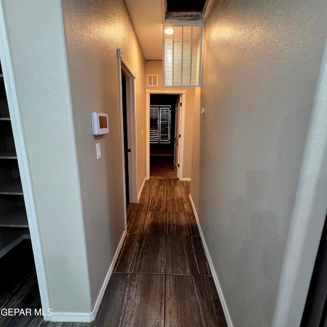 14368 Angel D Garcia Ct, El Paso, TX 79938 - hall featuring dark wood-style floors