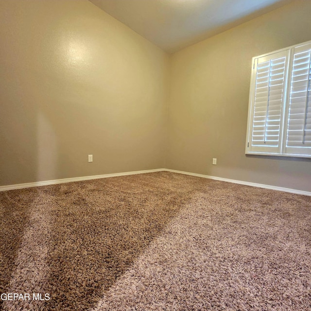 14368 Angel D Garcia Ct, El Paso, TX 79938 - unfurnished room featuring lofted ceiling and carpet floors