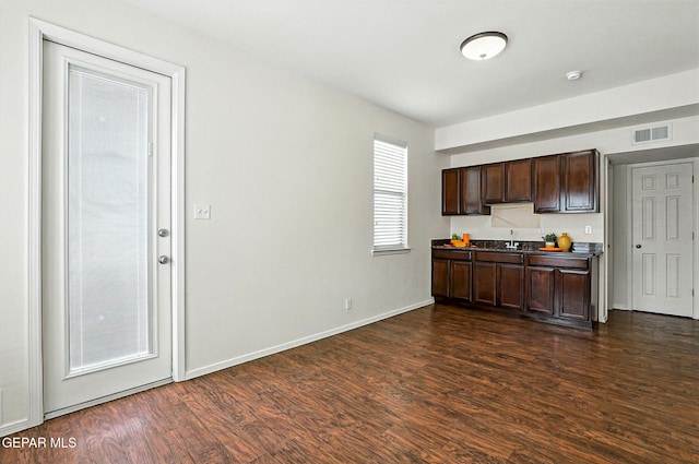11353 W Ranch Ct, El Paso, TX 79934 - kitchen with dark wood-style floors and dark brown cabinets