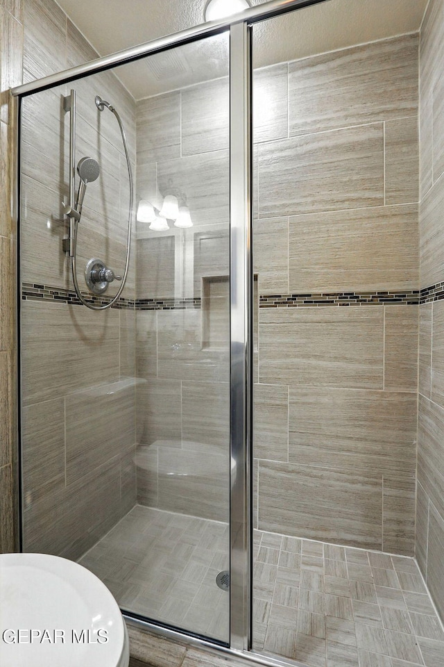 11353 W Ranch Ct, El Paso, TX 79934 - full bath with a stall shower and toilet