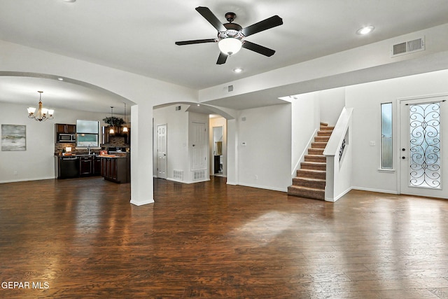 11353 W Ranch Ct, El Paso, TX 79934 - unfurnished living room with a chandelier, a ceiling fan, dark wood-style floors, stairs, and recessed lighting