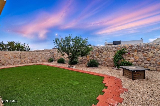 11353 W Ranch Ct, El Paso, TX 79934 - yard at dusk with a fenced backyard