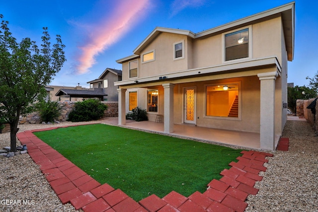 11353 W Ranch Ct, El Paso, TX 79934 - rear view of property featuring stucco siding and a patio