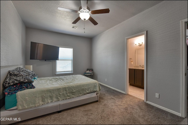 5949 Hidden Palms Dr, El Paso, TX 79924 - bedroom with carpet floors, ensuite bath, and ceiling fan