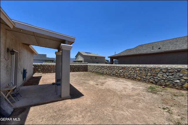 5949 Hidden Palms Dr, El Paso, TX 79924 - fenced backyard featuring a patio
