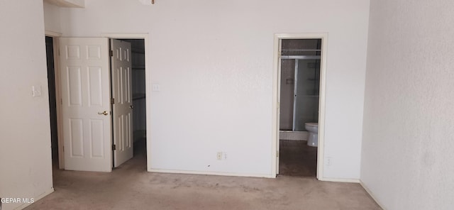 7342 Luz De Villa Ct, El Paso, TX 79912 - unfurnished bedroom featuring carpet and ensuite bathroom