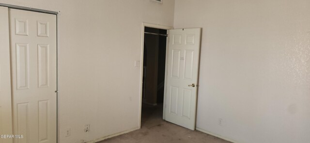 7342 Luz De Villa Ct, El Paso, TX 79912 - unfurnished bedroom with light carpet