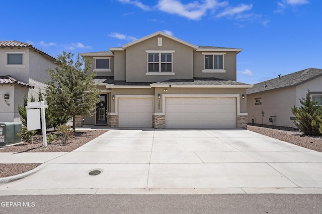 2228 Thawline Pl, El Paso, TX 79911 - view of front facade with a garage, stucco siding, driveway, and stone siding