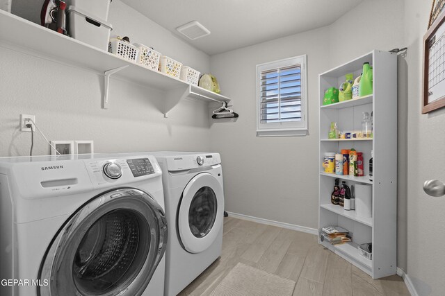 2228 Thawline Pl, El Paso, TX 79911 - washroom with independent washer and dryer and baseboards