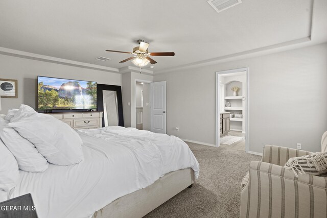 2228 Thawline Pl, El Paso, TX 79911 - bedroom featuring light carpet, a ceiling fan, and ensuite bathroom