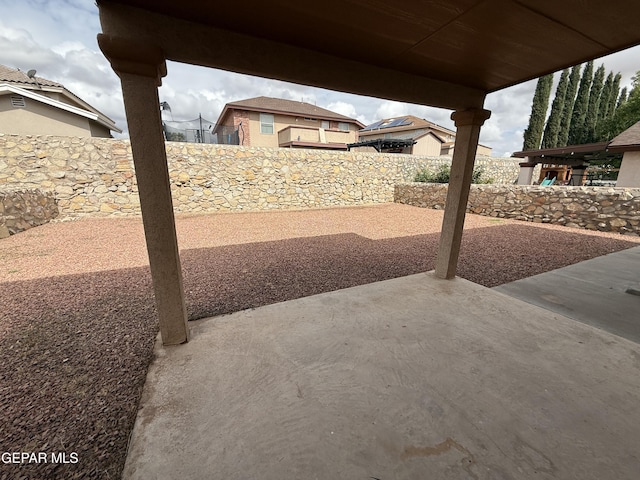 11025 Acoma St, El Paso, TX 79934 - fenced backyard with a patio