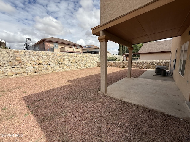11025 Acoma St, El Paso, TX 79934 - fenced backyard featuring a patio area