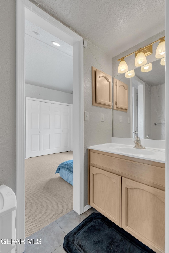 4328 Loma Alegre Dr, El Paso, TX 79934 - bathroom featuring vanity and a textured ceiling