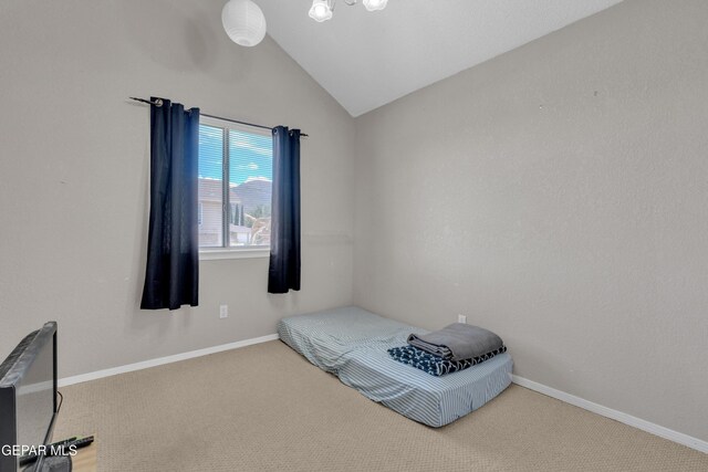 4328 Loma Alegre Dr, El Paso, TX 79934 - unfurnished bedroom featuring vaulted ceiling and carpet flooring
