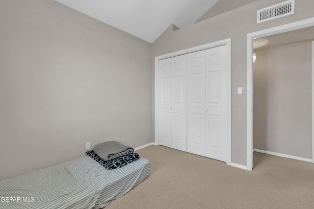 4328 Loma Alegre Dr, El Paso, TX 79934 - unfurnished bedroom featuring carpet flooring, vaulted ceiling, and a closet