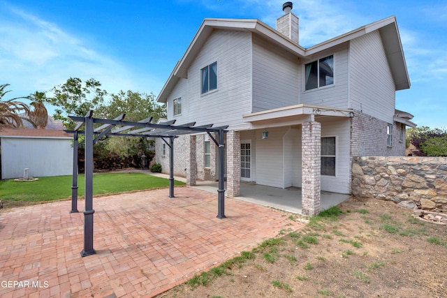 4328 Loma Alegre Dr, El Paso, TX 79934 - back of house with a pergola, a patio area, a chimney, an outdoor structure, and a lawn