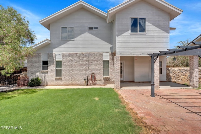 4328 Loma Alegre Dr, El Paso, TX 79934 - rear view of house with a patio area, a pergola, a lawn, and brick siding