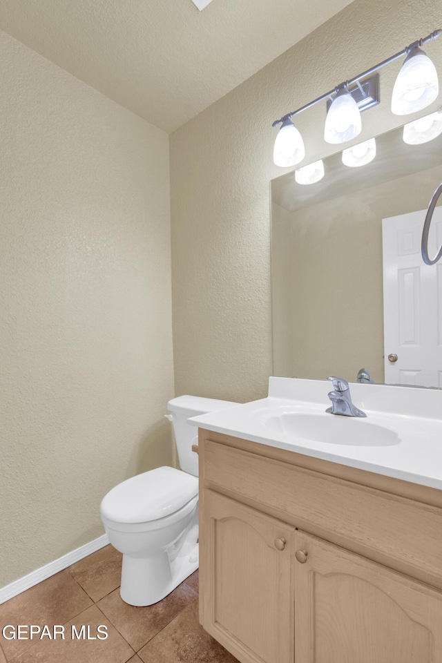 4328 Loma Alegre Dr, El Paso, TX 79934 - bathroom featuring a textured wall, vanity, and tile patterned floors